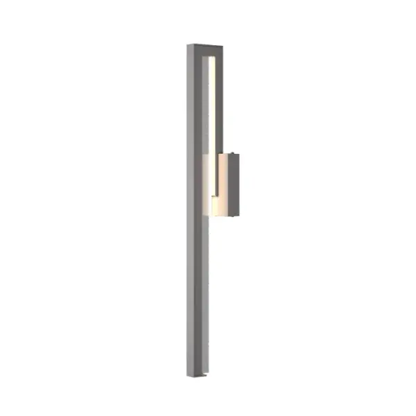 Accentuating the beauty of fundamental geometric shapes, the Edge is contemporary and decidedly influenced by architectural form. This large sconce features seeded glass for added sparkle.