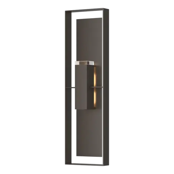 The Shadow Box Extra Tall Outdoor Sconce stands nearly 4 ft high (45”) greeting guests in a big way! This large scale outdoor wall-mounted fixture has an aluminum frame and backplate and is offered with a two-tone finish from among our robust Coastal Outdoor Finish options. The Shadow Box’s modern geometry and aluminum construction that is both lightweight and durable, make it perfect for a variety of exterior settings.