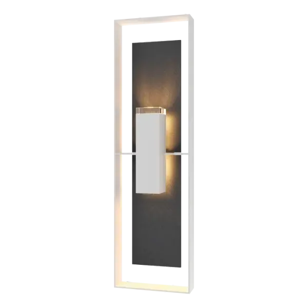 Make a great first impression with the Shadow Box Extra Tall w/Slate Outdoor Sconce standing nearly 4 ft high (45”). Designer David Martin, "was inspired by contemporary architecture but wanted a sensual minimalism accentuated by the dramatic lighting. Our Vermont black slate made for a natural backdrop." This large scale outdoor wall-mounted fixture has an aluminum frame and is offered with any of our robust Coastal Outdoor Finishes, all AAMA 2604-rated.