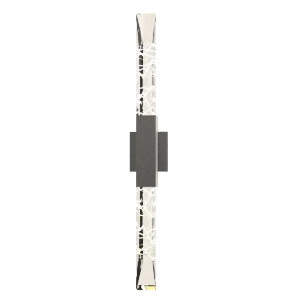The sleek crisp lines of the Refraction Double Outdoor Sconce assures distinction of exterior spaces. Twin bold prismatic glass towers, with the elegant look of cut crystal, guide the light upward and downward. Etched with geometric design, the light plays upon the pattern behind the glass, adding a radiant textural quality.