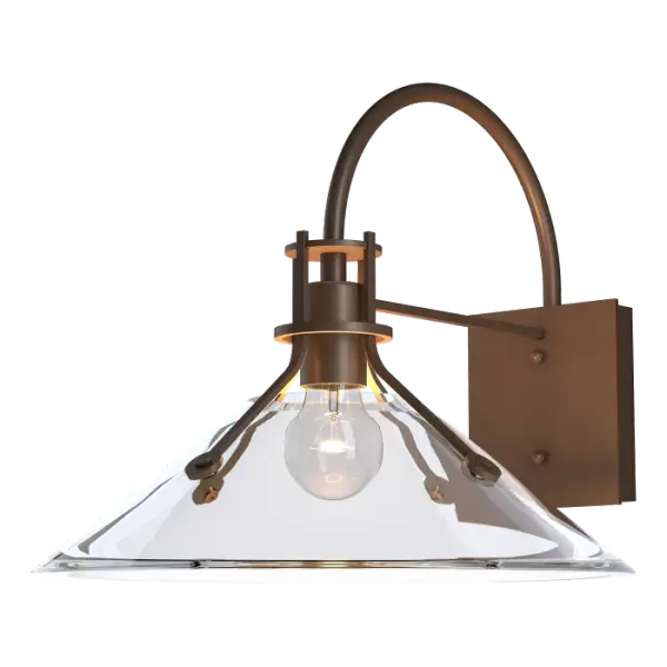 The Henry Outdoor Sconce now comes in a glass shade version, with a choice of clear or frosted glass. Offered in both Small and Medium options, this Henry puts a bright and contemporary twist on a classic favorite. Also available in an Outdoor Pendant option.