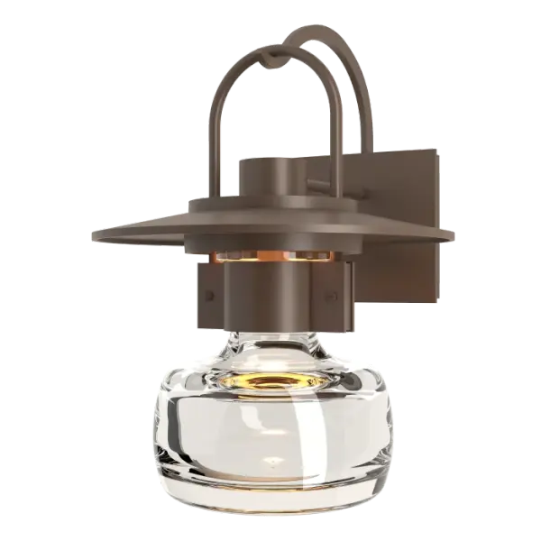 Our steampunk version of a traditional lantern is bold and striking. Our large Mason Outdoor Sconce shows plenty of craftsmanship, from the thick blown glass bell to the metallic curves of support arm and handle, to the details of the riveted collar-this has it all.