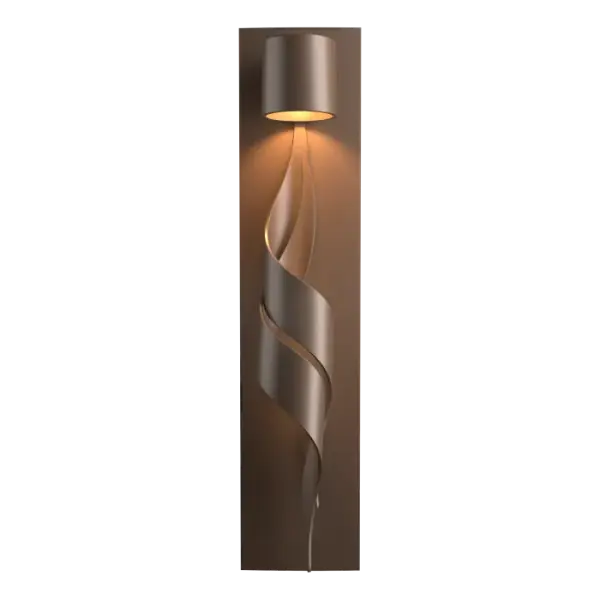 Don't be surprised if people stop to stare at the Flux Outdoor Wall Sconce - with the fine, handcrafted curves giving the illusion of movement and a hidden source of light. Shaped by our Vermont artisans.