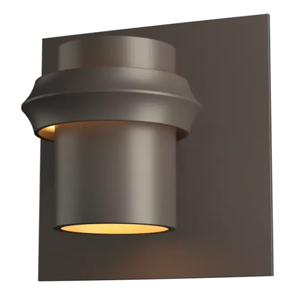 The classic contemporary design of the Twilight Dark Sky Friendly Outdoor Sconce makes a strong statement in its simplicity. A gentle glow emanates from the metal band that encircles the metal shade, giving off a twilight illumination into the night.