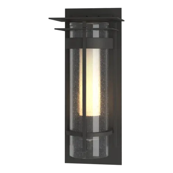 The Torch Outdoor Sconce with Top Plate is offered in 4 sizes, from Small to XL. The Torch Small version is 12.5" in height, crafted of aluminum, and includes a fixed top plate to preclude uplight. Available in any of our robust Coastal Outdoor Finishes.