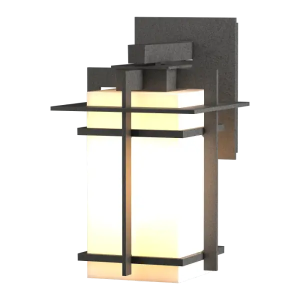 Although the design is in honor of traditional Japanese stone lanterns, our Tourou Outdoor Sconce is much easier to mount on the outside of your home or business. Metals bands crisscross and hug the square glass tube for design flare.
