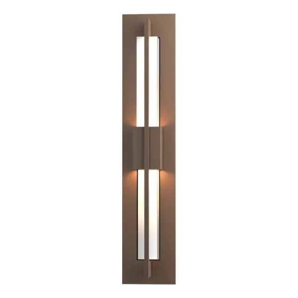 If you need to pull a design together, our small Double Axis LED Outdoor Wall Sconce can deliver the light of inspiration. A single, handcrafted aluminum arm angles around to clasp the glass at either end with a wider band bisecting the center.