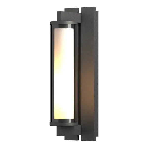 Industrial elegance best-describes the meeting of metal and glass in our Fuse Outdoor Sconce. Delicate double glass is bookended by sturdy metal bars. Handcrafted by the artisans here at our Vermont forge, each piece is unique.