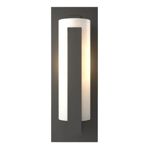 The vertical aluminum bar shielding the glass tube makes it clear where the name for our Vertical Bar Outdoor Sconce comes from. What's also clear, on closer look, is the craftsmanship and quality that goes into this seemingly simple wall sconce.
