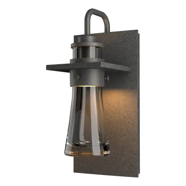 Inspired by the flat-bottomed Erlenmeyer flask, our outdoor sconce provides the catalyst for your design chemistry. The thick, clear blown-glass flask is encircled by a metal collar which is in turn, embedded in a metal plate. - alternate view