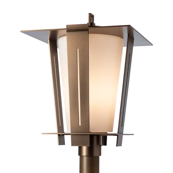 Pathways and driveways should be properly lit to enhance safety and security. The Linea Lantern Post Light does that with style.The lantern's opal shade allows the light to pass through, while diffusing any potential hotspots. Its sleek, geometric shape adapts to a variety of architectural styles, thanks to its transitional design. Offered in 7 standard Outdoor Coastal Finishes and available in 2 Marine Grade options (small upcharge applies). - alternate view