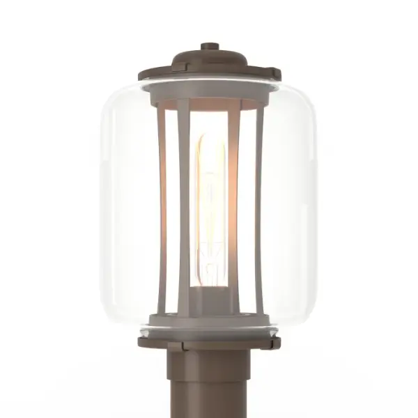 An inner hand-shaped metal cage-like structure surrounds the light and is encased in a large clear glass shade. The Fairwinds Outdoor Post Light is a welcoming beacon along driveways, walking paths and strategically placed landscape venues, adding safety for visitors. Available in a choice of robust Coastal Outdoor Finishes.