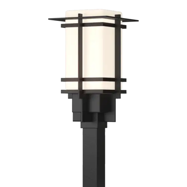Although the design is in honor of traditional Japanese stone lanterns, our Tourou Outdoor fixture is much easier to post-mount outside home or business. Metals bands crisscross and hug the square glass tube for design flare.