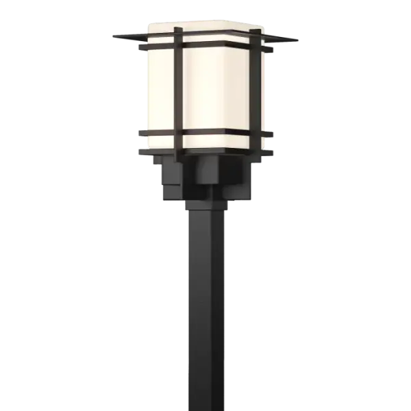Although the design is in honor of traditional Japanese stone lanterns, our Tourou Outdoor fixture is much easier to post-mount outside home or business. Metals bands crisscross and hug the square glass tube for design flare.
