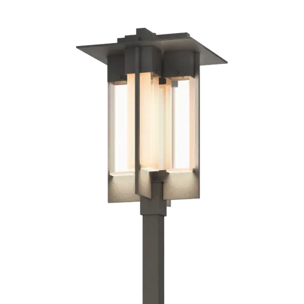 Light your way in grand style. Four handcrafted aluminum bars rise up and around to secure the glass of our large Axis Outdoor Post Light. A metal top plate and banding complete the sophisticated look.