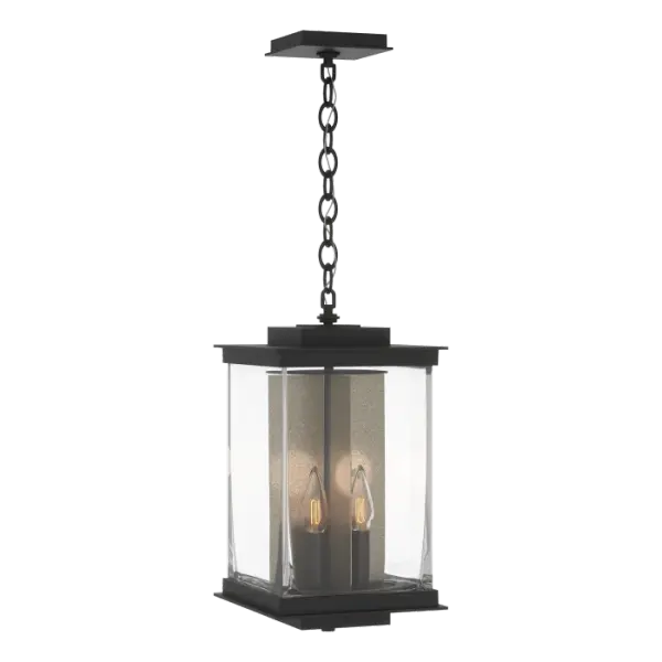 New for 2021, the Kingston Outdoor Collection includes Lantern, Post Light, and Wall Sconces. The Kingston Collection blends crisp architectural elements and candelabra lighting with a large rectangular blown glass that forms a versatile look on numerous home styles.This difficult to produce glass highlights the organic nature that clear glass can have with its subtle variations of thickness and patterns. The accent reflector plate behind each candelabra adds both a traditional element and a splash of contrast as it is available in our Vintage Platinum and Soft Gold finishes. This Kingston Outdoor Large Lantern is a chain-hung fixture that is perfect for any veranda or outdoor portico area. Also available in post light and wall sconce designs.