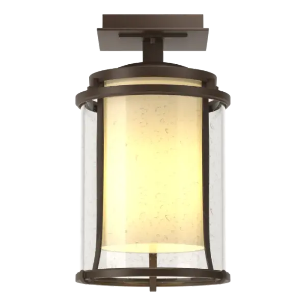 There's something to be said about the welcoming glow of a light as one pulls up to business or returns home on a dark night. There's more to be said when that warm glow comes from our small, artfully handcrafted Meridian semi-flush outdoor ceiling light.