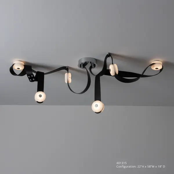 A study in mixed materials, the SNAPS Collection brings together leather, stone and metal to create something truly unique. "We’ve taken these classic elements and given them a new spin in the world of lighting," according to designer Andy Morter "using the latest in LED technology." NOTE: Alabaster is a natural, soft stone with an element of translucency. Each piece is unique. Part of the ART + ALCHEMY by Hubbardton Forge Collection. The SNAPS Medium LED Pendant features 6 alabaster-LED modules on two long and two shorter fine leather straps. Endless configurations. Unleash your creativity by ordering one of these extension pieces: 905700, 905701, 905712, 905713.