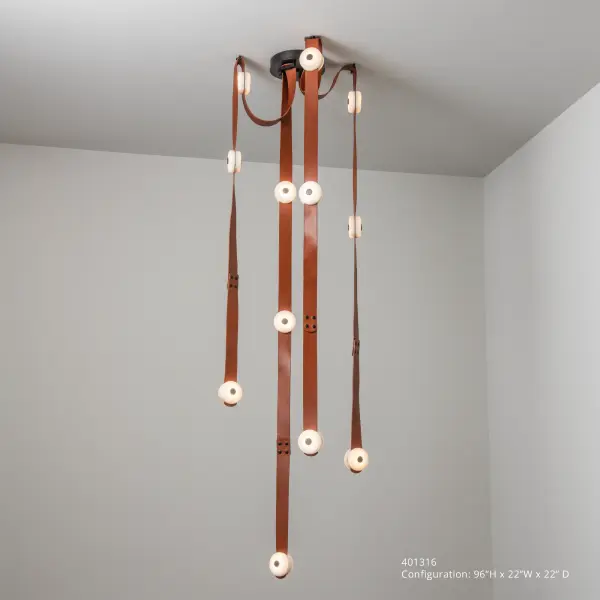Unleashed. Imagine the limitless design possibilities with the SNAPS Large LED Pendant elements: 12 alabaster/LEDs plus 4 long and 4 shorter fine leather straps. Mixed materials—alabaster stone, high-quality leather, metal fittings—combine with LED technology used in an exciting, innovative way, create the groundbreaking, new lighting system "SNAPS", designed by HF's Andy Morter. NOTE: Alabaster is a natural, soft stone with an element of translucency. Each piece is unique. Variations in color and markings is to be expected.Part of the ART + ALCHEMY by Hubbardton Forge Collection. Unleash your creativity by ordering one of these extension pieces: 905700, 905702, 905712, 905714. - alternate view