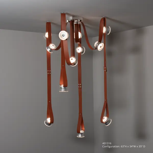 Wow. This 12-light, 4-strap SNAPS is a designer's delight. Customizable and scalable, it encourages designers to unleash their creativity! Two looped downlights, two looped 45º lights, eight additional lights, with ceiling mounts included make this so much fun to configure! The fine grain leather strapping is offered in a choice of 3 standard colors. Custom color options are available. Each LED component is diffused by a frosted downward glass and an inner "puck" diffuser on both upward and downward facing LEDs. A beautiful cone-shaped metal short outer housing gives this contemporary lighting system an industrial flair, like the iconic Hollywood spotlights used on classic film shoots—Action!
