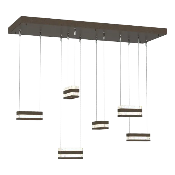 Make a statement in any room with the one-of-a-kind Stacks 6-Light Pendant from ART + ALCHEMY by Hubbardton Forge. The thick, clear, hand-poured blocks of glass ooze elegance, while the billet aluminum is foundational to the style of this light. The conductive LED cables pierce through the glass and aluminum stacks, providing a unique light element to its space. Stacks Pendant brings a minimalist, architectural aesthetic to your home.