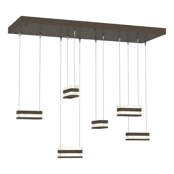 Make a statement in any room with the one-of-a-kind Stacks 6-Light Pendant from ART + ALCHEMY by Hubbardton Forge. The thick, clear, hand-poured blocks of glass ooze elegance, while the billet aluminum is foundational to the style of this light. The conductive LED cables pierce through the glass and aluminum stacks, providing a unique light element to its space. Stacks Pendant brings a minimalist, architectural aesthetic to your home. - alternate view