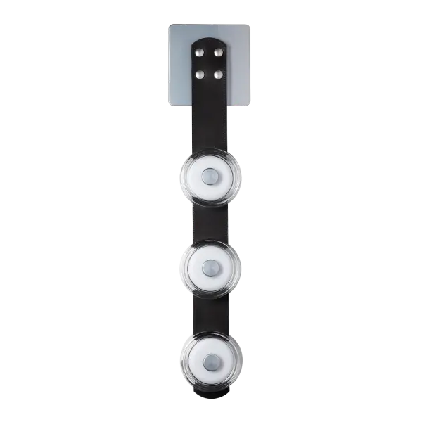 A brilliant trio! By popular demand, the three-light Snaps Sconce has arrived! Lots of functional, yet stylish light in a small, sleek form. A choice of three standard leathers (black, chestnut or white), or get creative and choose an option from our partner Spinneybeck's array of upholstery leathers (link provided). Each of the 3 LED discs is housed within a thick "puck" of clear glass or alabaster. Part of our patented SNAPS Collection. - alternate view