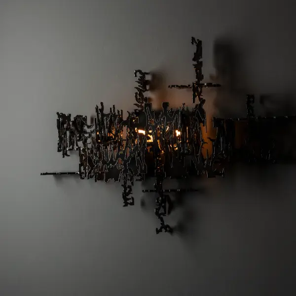 Brutus Sconce is a lighting fixture that demands your attention. The Brutalism movement of the ‘60s and ‘70s inspired the welded layers of steel that combine to create this unique wall mounted fixture. As much wall art as lighting, the Brutus Sconce is the perfect way to make a statement in any space. Part of ART + ALCHEMY by Hubbardton Forge. - alternate view