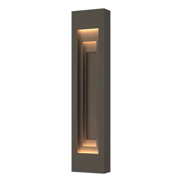 An interest in religious architecture was at the origin of the Procession Large Outdoor Sconce design, from ART + ALCHEMY by Hubbardton Forge. Influenced by a visit to Copenhagen’s Grundtvigs Kirke in the 1980s, our designer was intrigued by the use of forced perspective in a spatial progression that led to the creation of the Procession Collection. The church’s original arch was transformed to a simple rectangular portal made of aluminum. Designed for the outdoors, yet elegant enough for indoor use, as well.