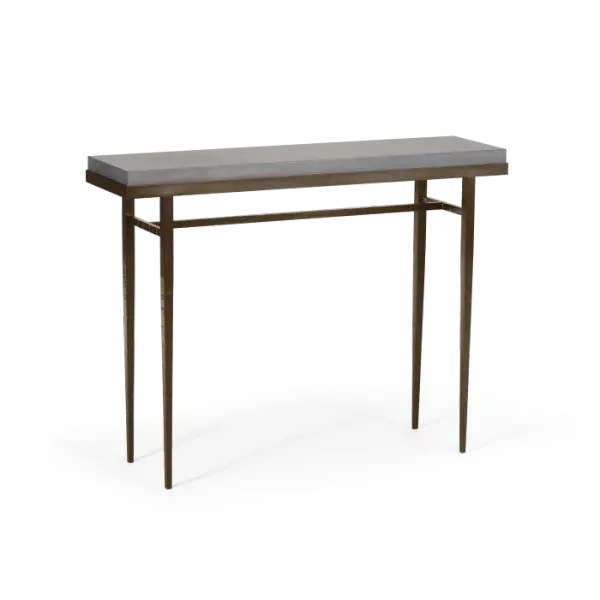 The Wick Collection's mid-sized console table is perfectly suited to a variety of spaces. With three options (Clear, Grey, and Espresso) of iconic solid Vermont maple wood, the Wick 42" Console Table offers a great deal of versatility. With its 1.5" thick, solid maple wood top securely nestled in its steel frame, the Wick's long, elegant steel legs are hand-hammered and extend to the floor in a sleek taper, for a classic table with a contemporary design. Available in all standard finishes.