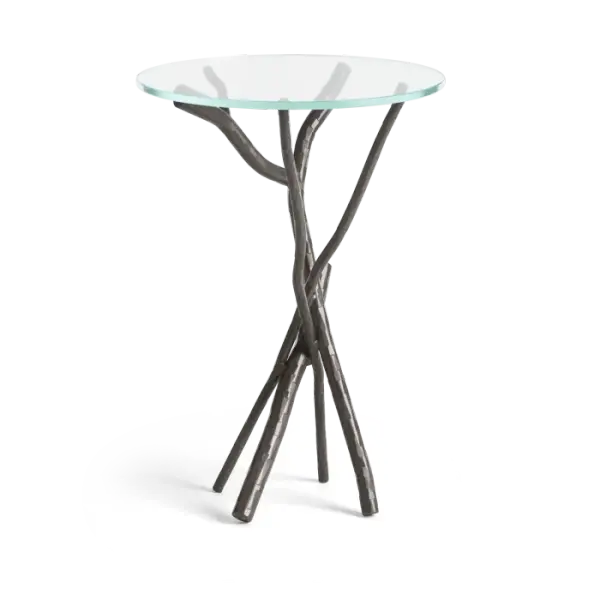 Every facet on every branch is individually hammered in our forge to create a unique sculptural base that supports a tempered glass top. The Brindille Accent Table is available in all standard finishes. It is the perfect side or accent table for an organic, handcrafted, sculptural statement in any setting.