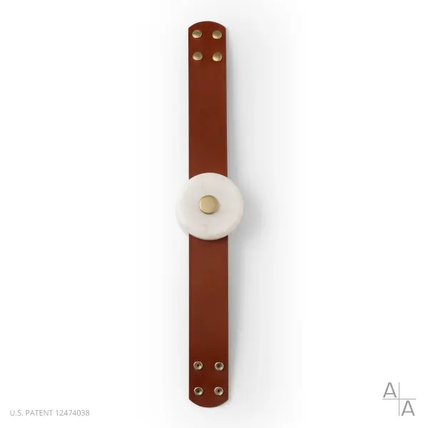 Looking to customize your SNAPS lighting system and need additional leather straps? This 24" strap extension can be used to create a unique design to perfectly suit its space. This product comes with an LED/alabaster light module. NOTE: Alabaster is a natural, soft stone with an element of translucency. Each piece is unique. Contact Customer Service should you have any questions.