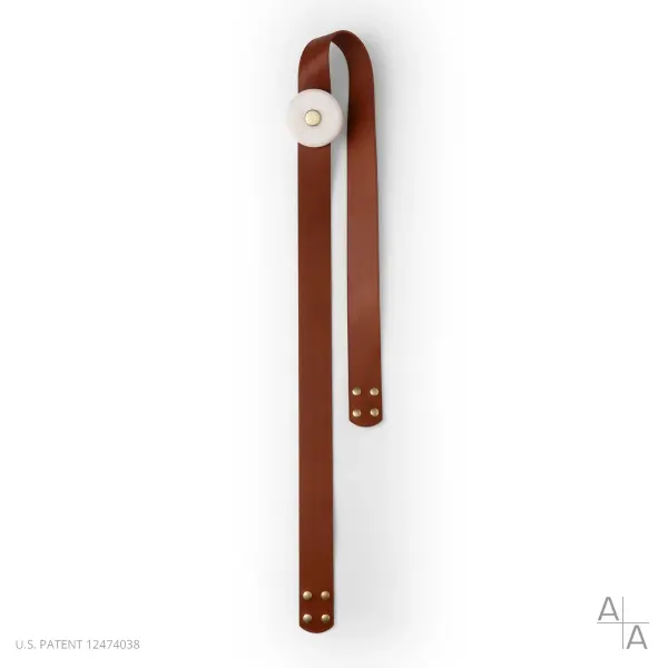 Looking to customize your SNAPS lighting system and need additional leather straps? This 72" strap extension can be used to create a unique design. This product comes with an LED/alabaster light module. NOTE: Alabaster is a natural, soft stone with an element of translucency. Each piece is unique. Contact Customer Service should you have any questions.