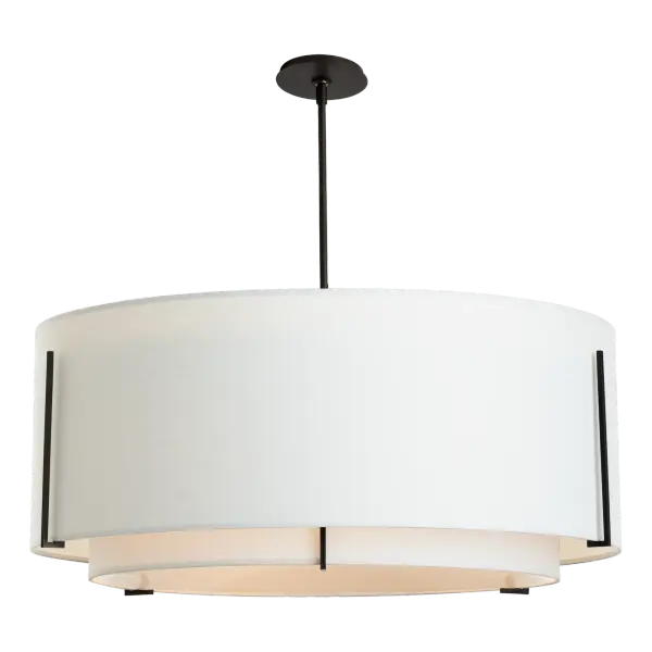The double-shade design of our Exos Large Scale fixture delivers the sleek, clean and minimalistic elegance the collection is known for. The contrasts between metal and fabric, vertical lines and horizontal planes are striking.