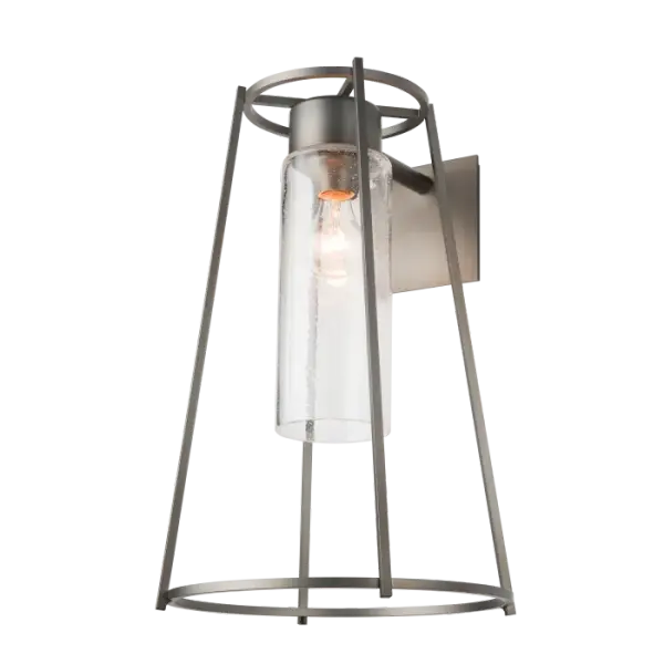 The Loft Outdoor Sconce is a clean modern version of classic conical lantern design. The open geometric frame is lit from within by your choice of seeded or opal glass cylinders. Also available in standard and large versions. - alternate view
