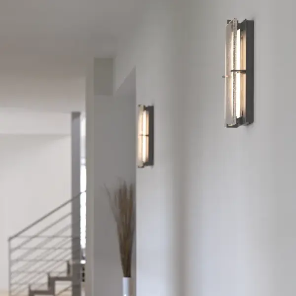 The LED concealed by opaque glass provides the illumination for our outdoor sconce. But the real shining design element is the thick, seeded-glass panel. Handcrafted by artisans here at our forge in Vermont, each piece is unique. - alternate view