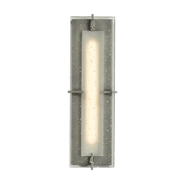 The LED concealed by opaque glass provides the illumination for our outdoor sconce. But the real shining design element is the thick, seeded-glass panel. Handcrafted by artisans here at our forge in Vermont, each piece is unique.