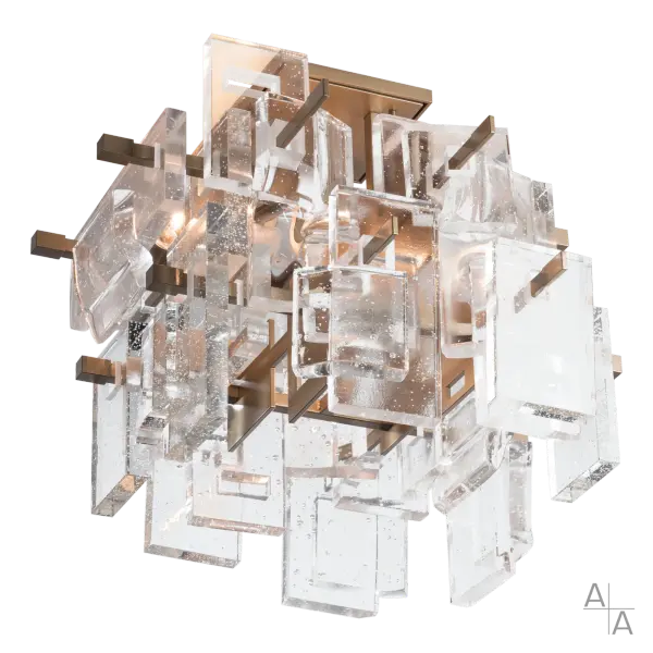 The Fusion Semi-Flush is the perfect fusion of art and function. The geometric steel framework is a modern take on the classic ceiling light fixture, while the intersections of metal and suspended fused, thick, clear, seeded glass create a stunning effect. Part of ART + ALCHEMY by Hubbardton Forge.