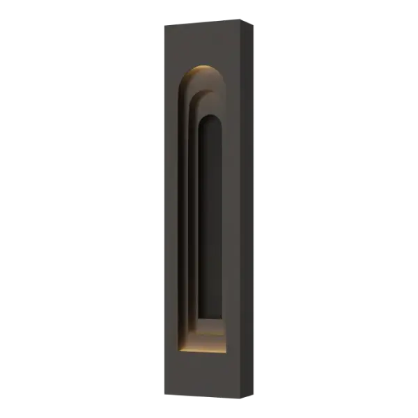 The Procession Arch Large Outdoor Sconce is a creative interpretation of the interior of the Grundtvigs Church in Copenhagen that our designer visited while studying architecture. The varying depth of field created by a trio of aluminum arches provides a balanced aesthetic that's both modern and timeless. Made for the outdoors, yet elegant enough for indoor use, as well. Part of ART + ALCHEMY by Hubbardton Forge.