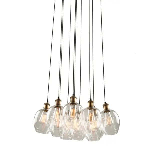 The “Clearwater” collection has clear dimple type glassware which is suspended on black cables with vintage brass plated socket covers. Many sizes available. Comes in vintage brass as shown or in polished nickel. This series is designed and manufactured in North America