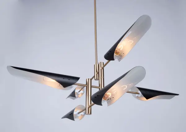 The Modern Renaissance collection is very stylish and trendy. The semi gloss black metal shades are painted in reflective white on the interior. The balance of the chandelier is plated in harvest brass. Multiple rods are included for desired height. (Also includes hang straight for sloped ceilings). 6 light model shown (4 lite also available). - alternate view