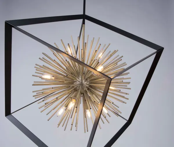 The Sunburst Collection chandelier is unique and a definitely beautiful focal point. The exterior frame is matte black encasing a satin brass cluster of thin hollow rods. (Smaller size and flush mount also available) - alternate view
