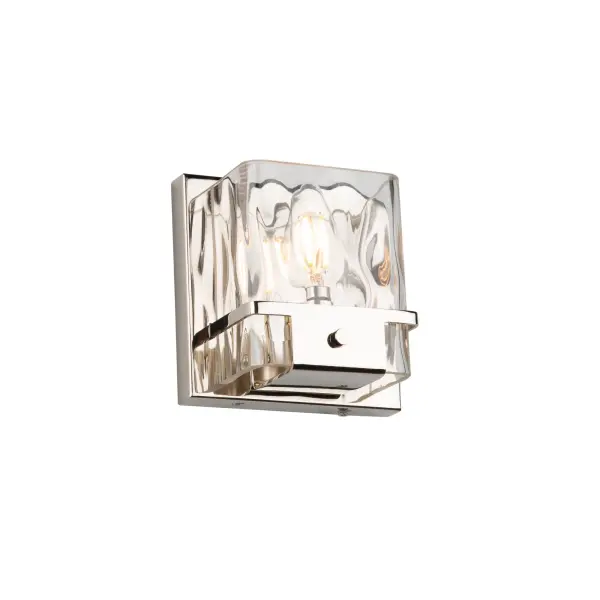 Designed by Lighting Pulse, the “Wiltshire” bathroom vanity features thick luxurious hammered type glassware complimented by a polished