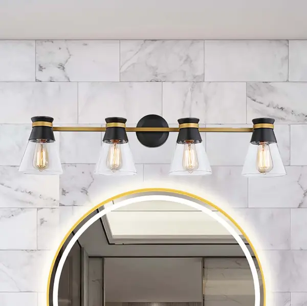 Black & Brushed Brass The Kanata collection by designer Kevin Kraemer is unique, stylish and soft. This collection features clear tapered glassware that is held by thin arms that wrap around the cups to finish off the design. The matte black cups are complimented with a smooth brass finish on the arm banding. 4 light version shown - single and three light versions also available. (Alternate colour option available - Polished nickel and black - alternate view