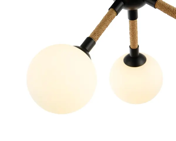 The Capilano collection features an elegant design enveloped in stylish natural jute, complemented by a black metal frame and circular white acid glassware. The fixture boasts clean lines, enhancing its overall aesthetic appeal. The careful integration of these elements creates a sophisticated and attractive lighting solution. The model shown is a 3 light semi flushmount. (G9 socket) - alternate view