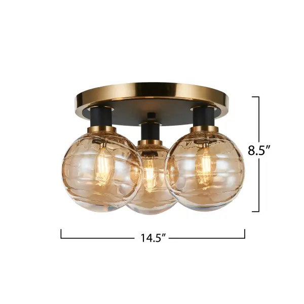 Amber Glass Black and Brushed Brass The Gem Collection with champagne glassware has a rich, translucent amber hue with a high level of clarity, allowing light to pass through while casting a warm, golden tone. This model is a 3 lite semi