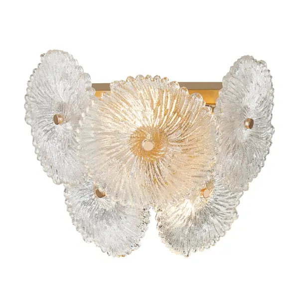 The defining feature of the Bloom collection lies in its enchanting glassware, meticulously crafted to resemble delicate and intricate flowers. The combination of the lustrous brass metal work and the floral-inspired glass elements makes this collection a captivating focal point for any space. The 2 light wall sconce is shown. (Matching chandeliers and wall sconce available) - alternate view