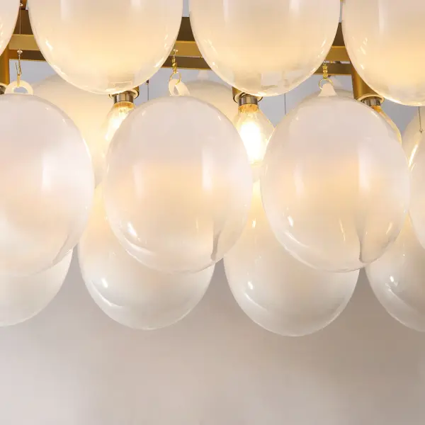 Globo Eight Light Island Chandelier in Brass - Image 4