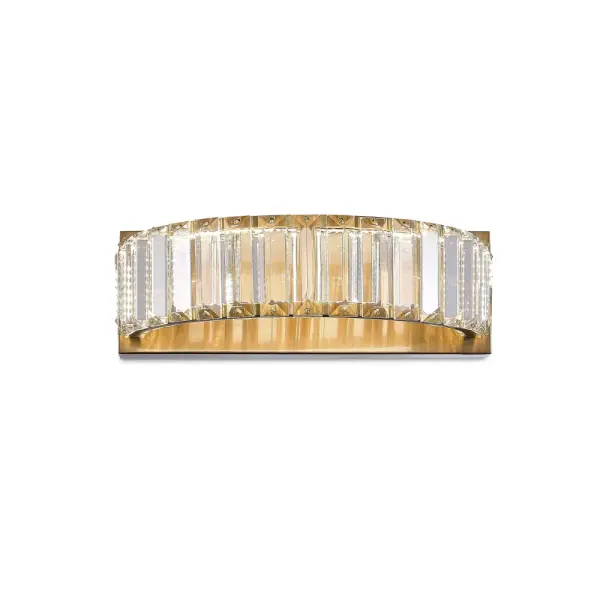 The Stella Collection wall sconce features dazzling crystals which are illuminated by bright LED. The frame is finished in a rich brushed brass. Due to its LED light source it is energy efficient. This model is dimmable and back with a 5 year warranty on the LED. - alternate view