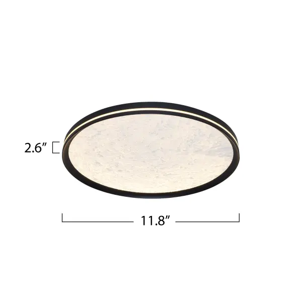 This LED flushmount from the Luna Collection is a celestial masterpiece, blending modern elegance with cosmic allure. Its black frame cradles a textured “moon crater” lens, through which a soft, glittering glow emanates, evoking the magic of starlit skies. A subtle side cutout allows ambient light to gracefully spill onto the ceiling, creating a halo-like effect that transforms any space into a serene sanctuary. The frame of this flushmount is black.